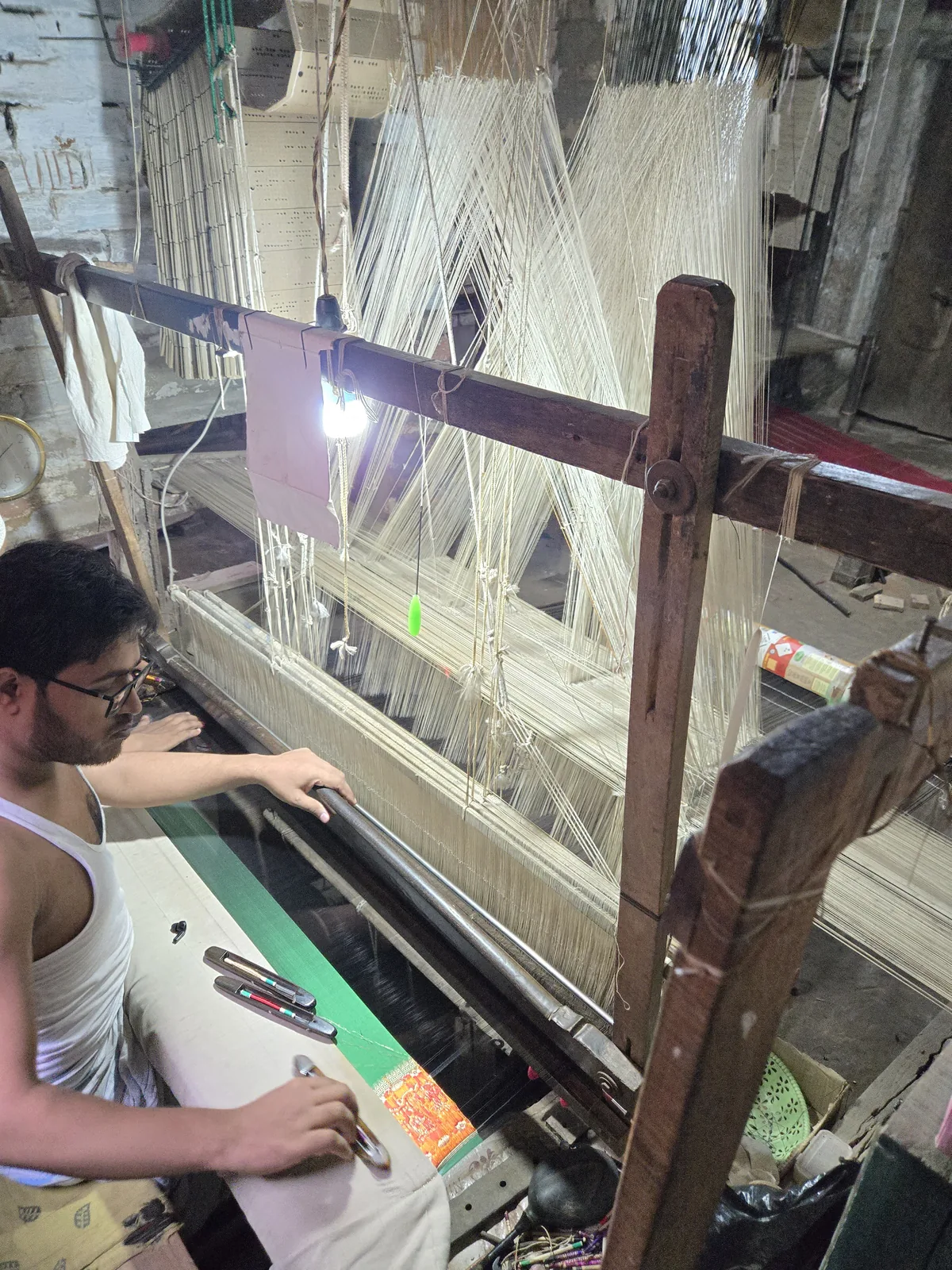 Banarasi handloom weaver crafting fabric for Choubey Silk in Varanasi