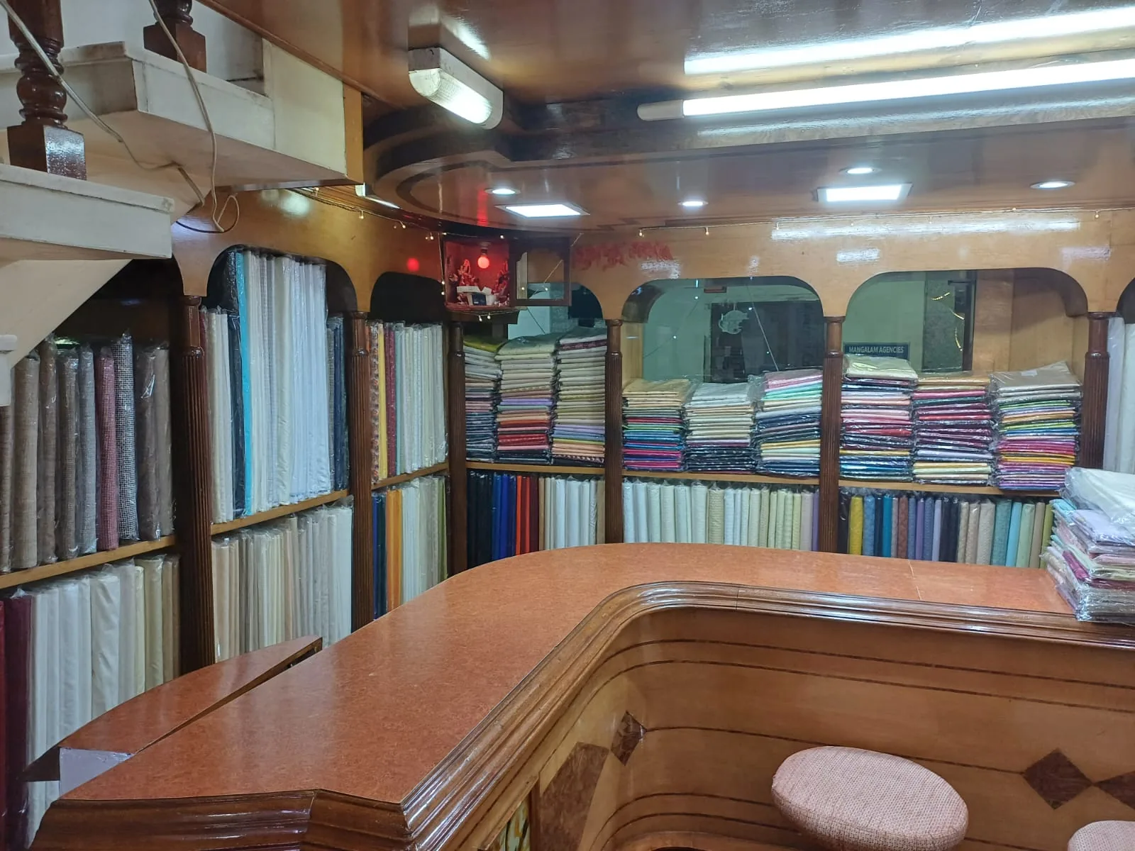 Premium Banarasi silk fabric collections inside the Piyush Silk showroom